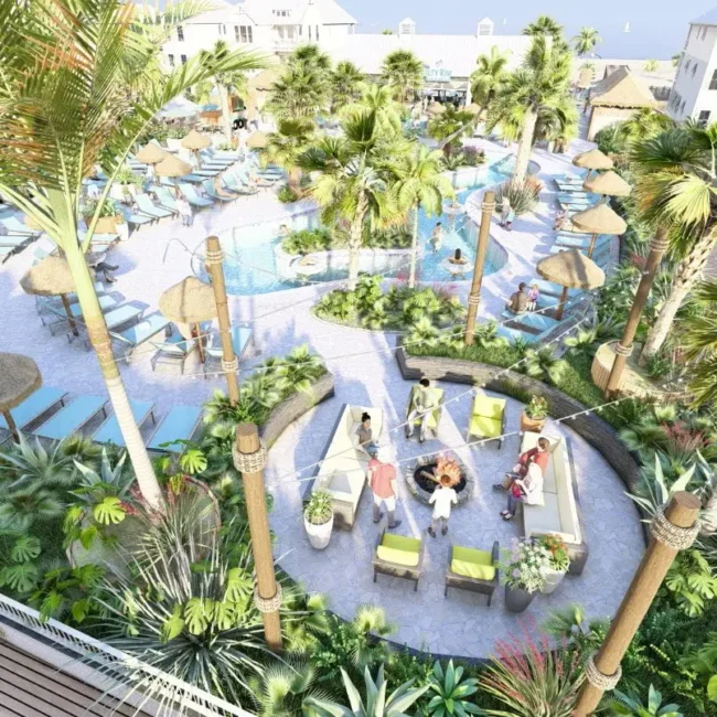 Rendering — Aerial view of sun loungers, fire pit, and cabanas