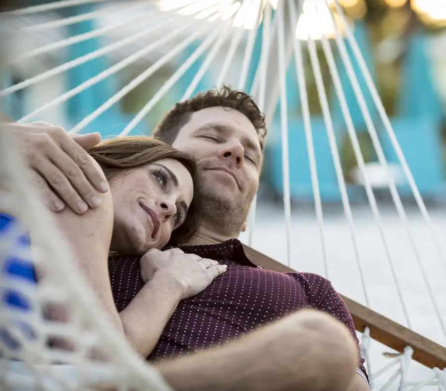 Couple relaxing on a hammock